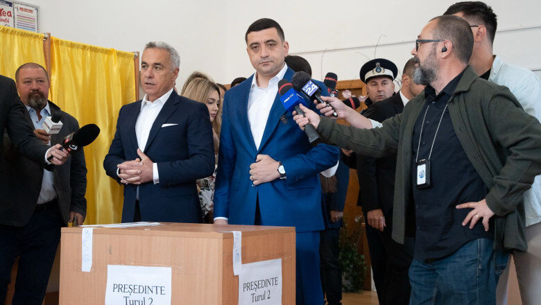 video calin georgescu si george simion impreuna la vot liderul aur am votat impotriva celor care ne desconsidera pe toti 6829798871ff9